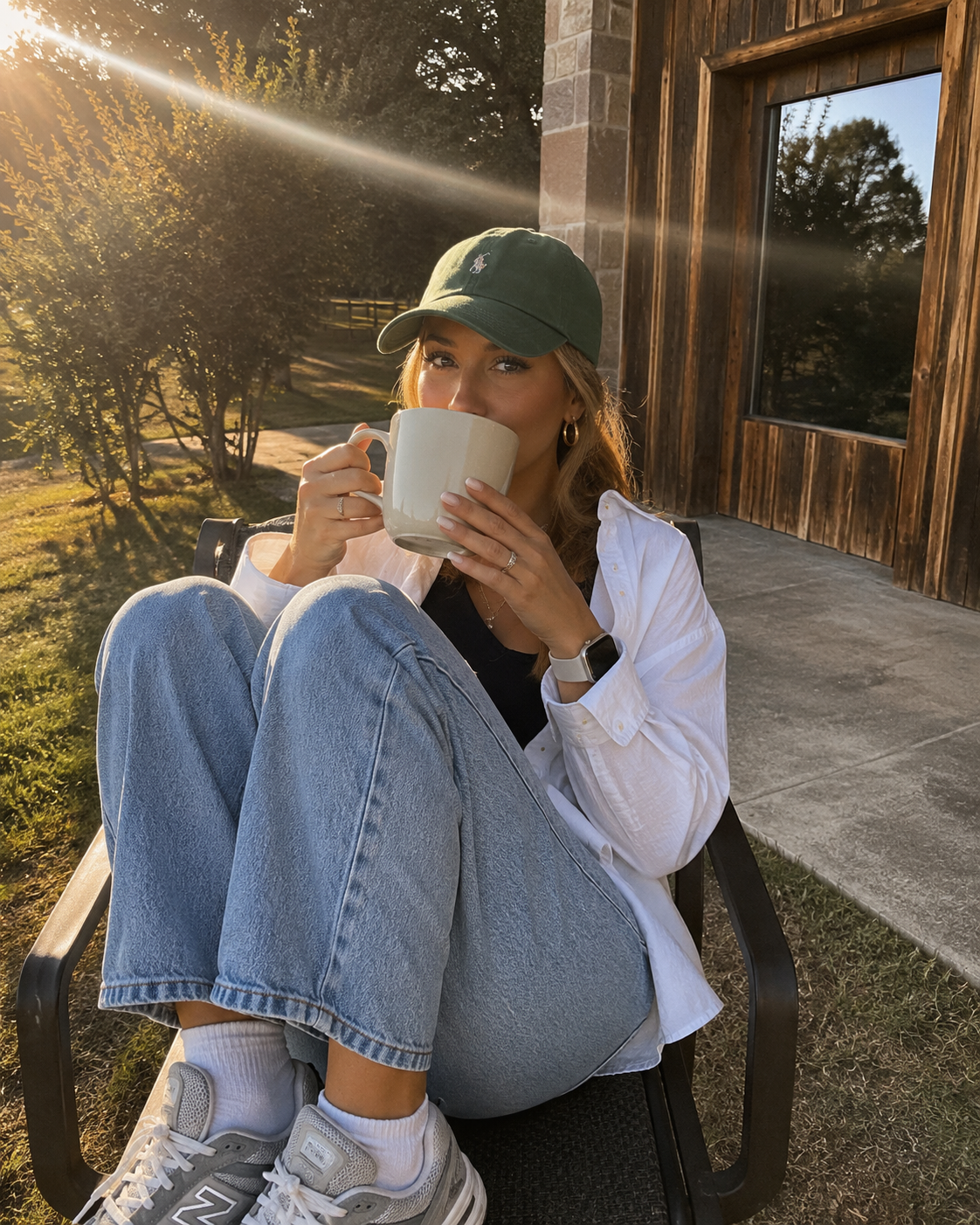 Lyndsey enjoying coffee outside while working from home